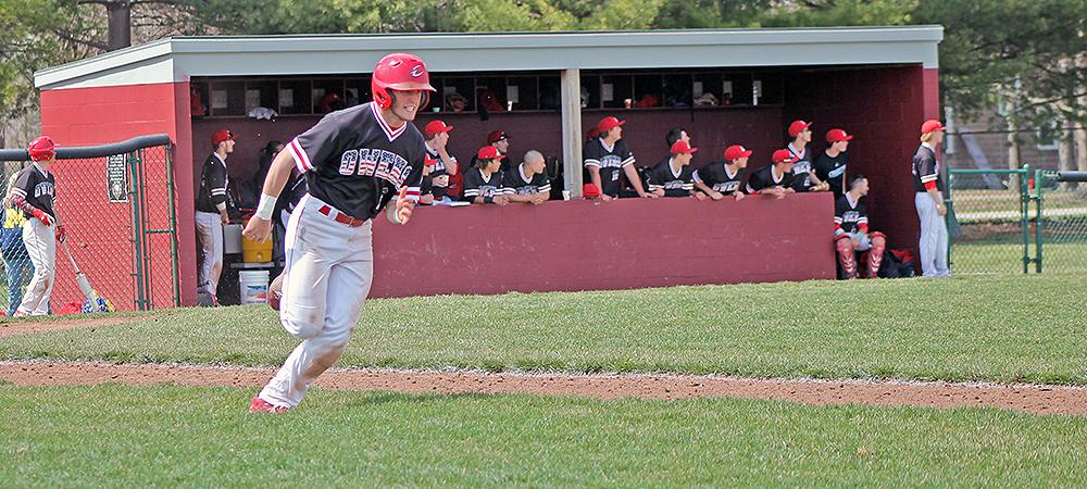 Casey Gose looks to round first after one of his four hits in today's doubleheader vs Cuyahoga. Photo by Kylie Reynolds/Owens Sports Information