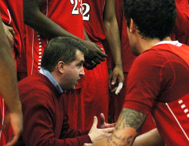 Dave Clarke talks to his team in today's 90-65 win over Macomb Community College. Photo by Nicholas Huenefeld/Owens Sports Information