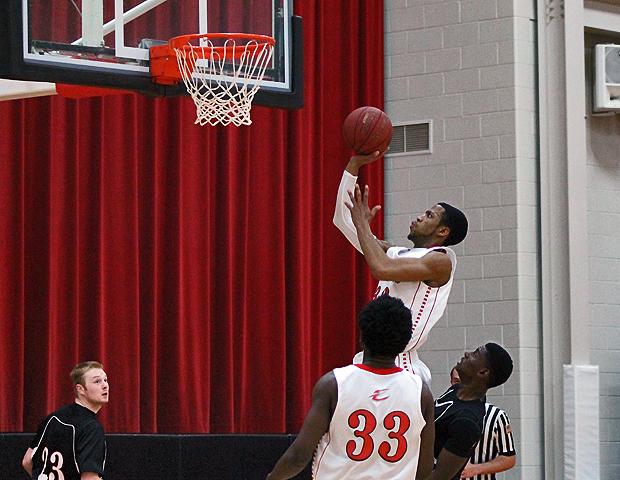 John Murry scores on a fast break in the second half of today's 116-92 win over No. 17 Sinclair Community College. He had a season-high 28 points. Photo by Nicholas Huenefeld/Owens Sports Information
