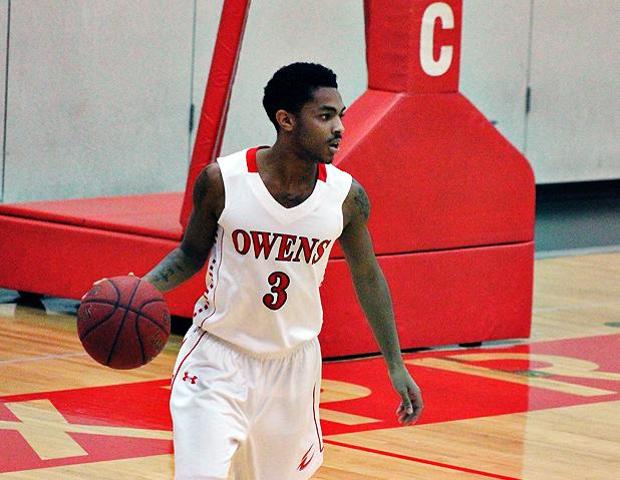 Justin Baker had 12 points and 11 assists in tonight's win over Muskegon. Photo by Nicholas Huenefeld/Owens Sports Information