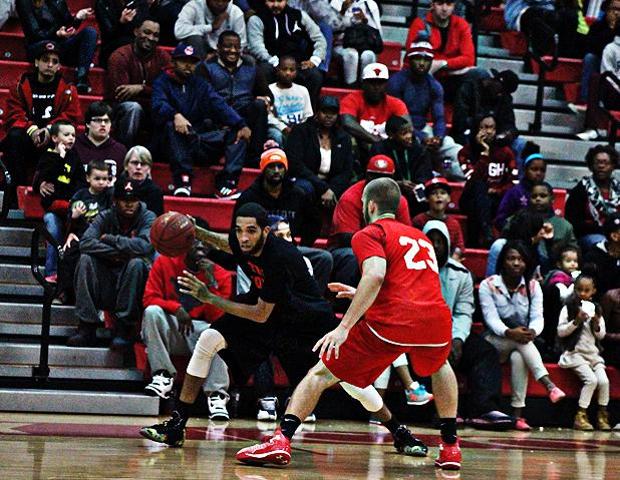 Nate Miles of Team Toledo looks to move around Austin Somerfield in front of tonight's packed crowd. Miles had a game-high 23 points. Photo by Nicholas Huenefeld/Owens Sports Information
