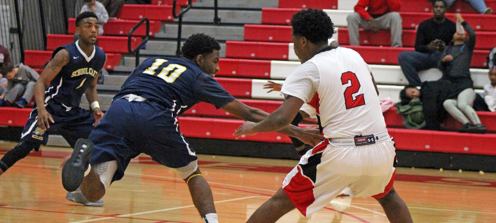 Roy Hatchett crosses up a defender before attempting a 3-pointer. Photo by Nicholas Huenefeld/Owens Sports Information