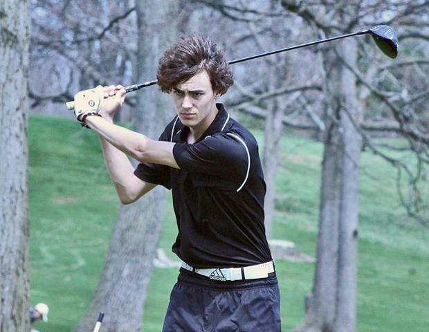 Brandon Hoelzer's hair, and his 73, helped the No. 2 Express golf team capture their fourth straight OCCAC tournament championship on Sunday. Photo by Nicholas Huenefeld/Owens Sports Information
