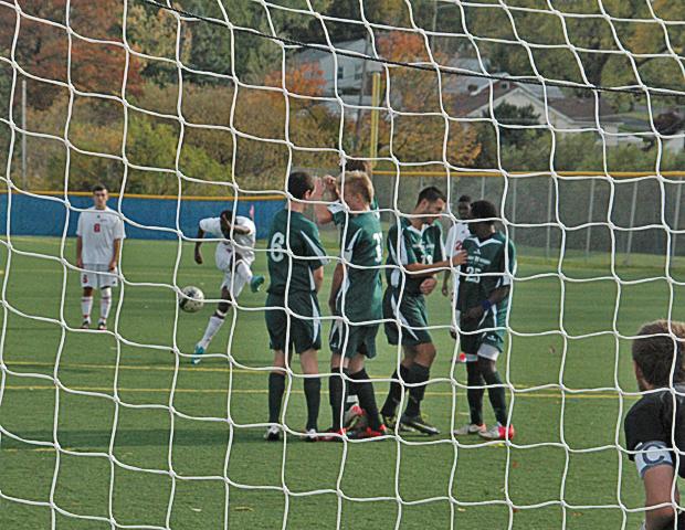 Glenroy Miller connects on a direct free kick to score his 24th goal of the year, which put the Express up 1-0. They would go on to win 4-0, while Miller added another goal later in the second half. Photo by Nicholas Huenefeld/Owens Sports Information
