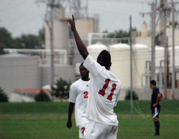 Glenroy Miller signals where the Express finished in the Lincoln Land Invitational Tournament after the Express defeated host school Lincoln Land 3-0 on Sunday. Miller scored twice, while Nickyle Webber, pictured near Miller, added his third goal of the season. Photo by Nicholas Huenefeld/Owens Sports Information