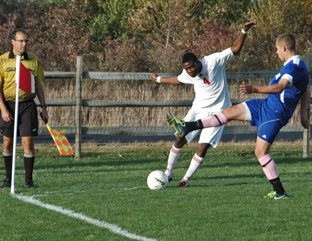 Vijay Gentles looks to cross a ball against Lakeland CC. The freshman scored two goals today as the No. 15 Express clinched at least a share of the OCCAC championship, their first in program history. Photo by Nicholas Huenefeld/Owens Sports Information