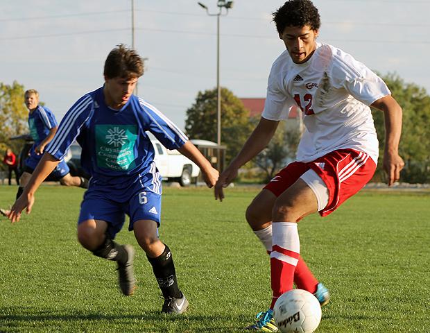 Ahmad Jarrar looks to make a move offensively against a Cuyahoga defender today. The freshman picked up his eighth and ninth goals of the season today. Photo by Nicholas Huenefeld/Owens Sports Information
