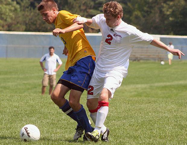 Austin Combs, pictured here against a Muskegon defender, scored his team's fourth goal today. Photo by Nicholas Huenefeld/Owens Sports Information