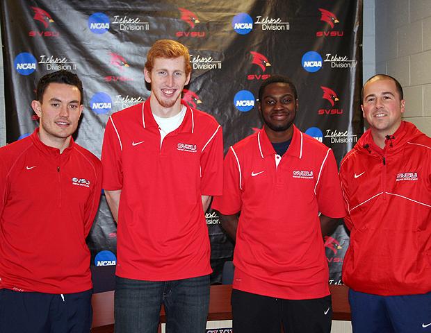 Josh Kleinow (second from left) and Troy Watson (second from right) signed with Saginaw Valley State University yesterday. They are joined by SVSU men's soccer assistant coach Michael O'Neill (far left) and SVSU head men's soccer coach Cole Wassermann (far right). Photo by Bonnie Kleinow/Owens Sports Information