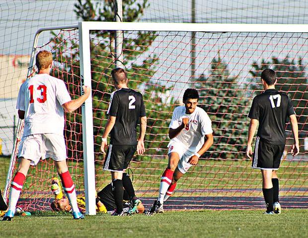 Ahmad Jarrar fist pumps after heading in the game-winning goal at the 83:40 mark today. Photo by Nicholas Huenefeld/Owens Sports Information