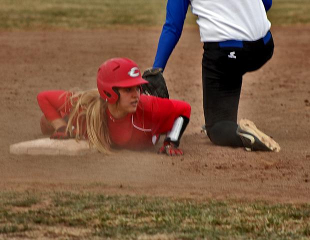 Josie Hall slides safely into third in today's second game against Lakeland. She had five RBIs in the pair of games. Photo by Nicholas Huenefeld/Owens Sports Information