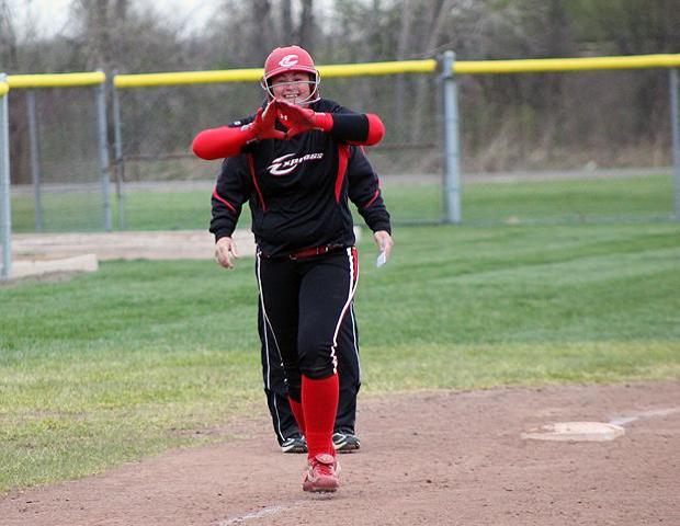 Sophomore first baseman Molly Gast celebrates her homer while rounding third in today's second game win over Grand Rapids Community College. Photo by Geoff Roberts/Owens Sports Information