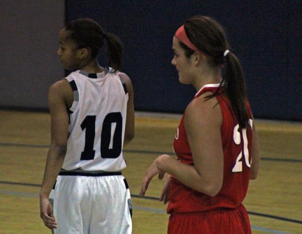Emma Ricketts prepares for a free throw as Columbus State's Karis Watts walks nearby. The sophomore had a team-high 28 points as she helped her team capture an outright OCCAC championship today. Photo by Nicholas Huenefeld/Owens Sports Information