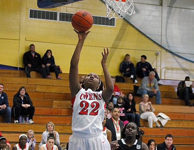 Karahn Scott scores two of her career-high 28 points against Erie CC today. Photo by Nicholas Huenefeld/Owens Sports Information