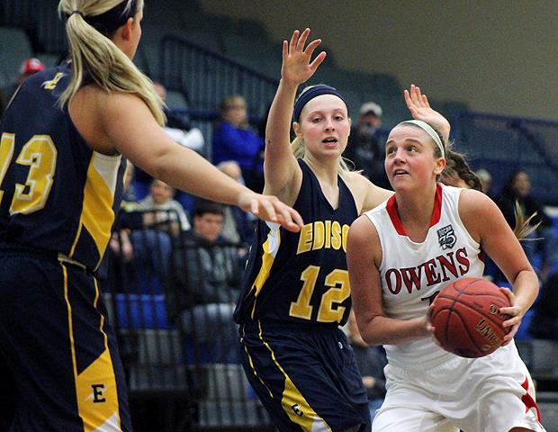 Paige Wright drives the lane against Edison in today's district semifinal. Photo by Geoff Roberts/Owens Sports Information