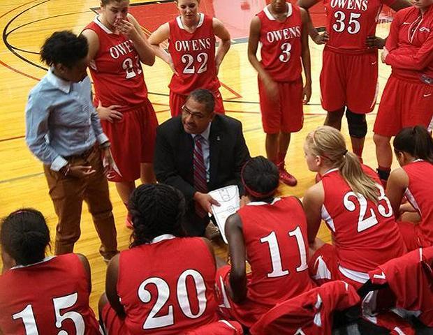 Head coach Mike Llanas talks to his team during a timeout in today's 65-63 loss to Kirkwood Community College. Photo by Kelly Llanas/Owens Sports Information