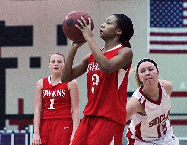 Zhana Randolph attempts a shot in the second half of today's 111-66 win over Sinclair Community College. Photo by Geoff Roberts/Owens Sports Information