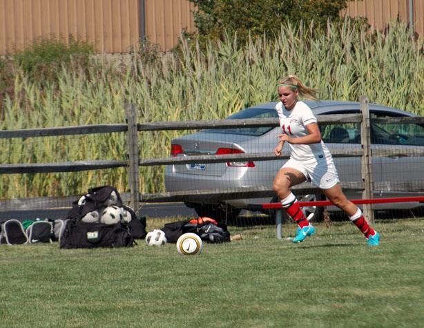 Kendra Eitniear dashes down the sideline. The sophomore scored both goals for the Express in a 2-0 win over Muskegon CC today. Photo courtesy of Nicholas Huenefeld/Owens Sports Information