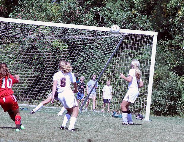 Haley Gasser (10) watches her shot sail into the top right corner of the net today. Her goal put the Express up 1-0 en route to a shutout victory over Lake Michigan. Photo by Nicholas Huenefeld/Owens Sports Information