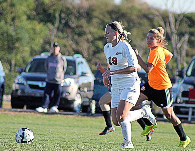 Haley Malaczewski runs past an Indiana Tech defender in today's 9-1 win. The sophomore had three goals and one assist in the game. Photo by Nicholas Huenefeld/Owens Sports Information
