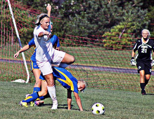 Haley Malaczewski battles a Muskegon defender. She scored the game winning goal in today's 3-2 win. Photo by Nicholas Huenefeld/Owens Sports Information
