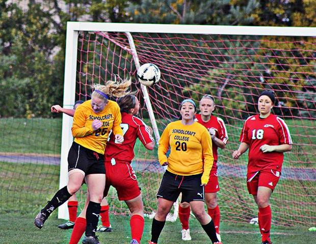 Jordyn Wright and a player from Schoolcraft College battle for a ball late in today's 1-1 double overtime tie. Wright had the lone goal for Owens. Photo by Nicholas Huenefeld/Owens Sports Information