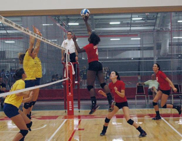 Dakia Sellers pushes the ball over the net for the Express against Illinois Central. The Express finished the Owens Invitational with a 5-2 record. Photo by Nicholas Huenefeld/Owens Sports Information