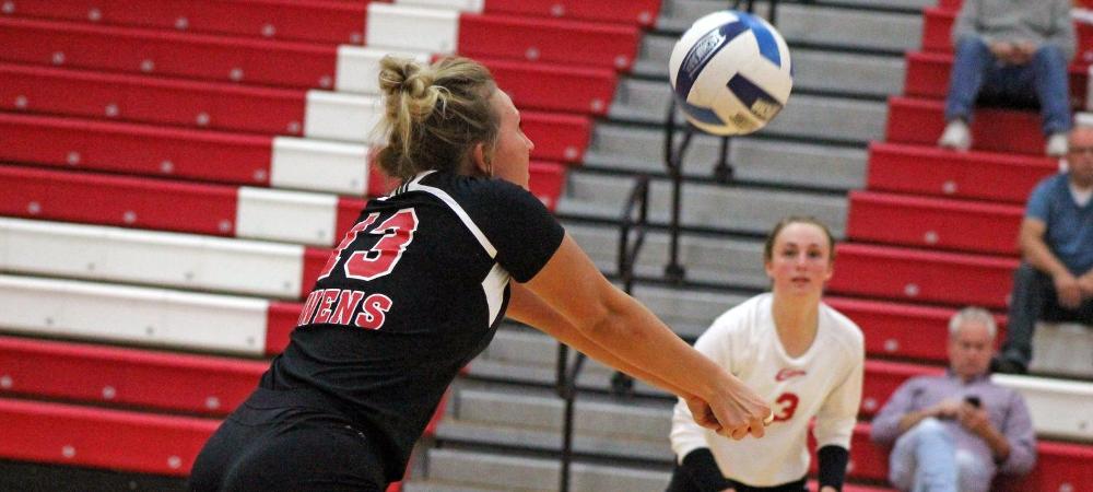Deanna Smith produces one of her six digs today. Photo by Nicholas Huenefeld/Owens Sports Information