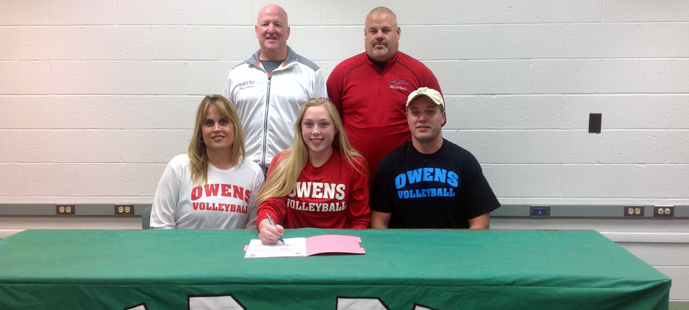 Michaela Eisenhauer is accompanied by her parents, Heather and Scott, along with Owens volleyball assistant coaches Denny Caldwell and Bill Bonham on signing day. Photo provided to Owens Sports Information
