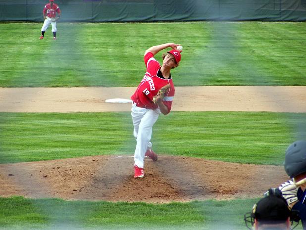 Jeff Davis delivers a pitch against Adrian College. The sophomore picked up the win in the second game with his two scoreless innings in relief. Photo courtesy of Owens Sports Information