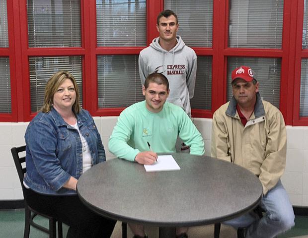 Chad Lupher (front center) became the newest member of the 2013-14 Express baseball freshmen class recently. The East Knox HS senior is surrounded by his parents Bill and Robin, as well as Express baseball head coach Devin Taylor. Photo by Owens Sports Information
