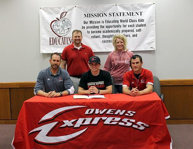 Casey Gose is joined by his parents, as well as Owens head baseball coach Devin Taylor (front right) and Owens assistant baseball coach John Parisho (front left) after signing his letter of intent to play at Owens. Photo by Owens Sports Information