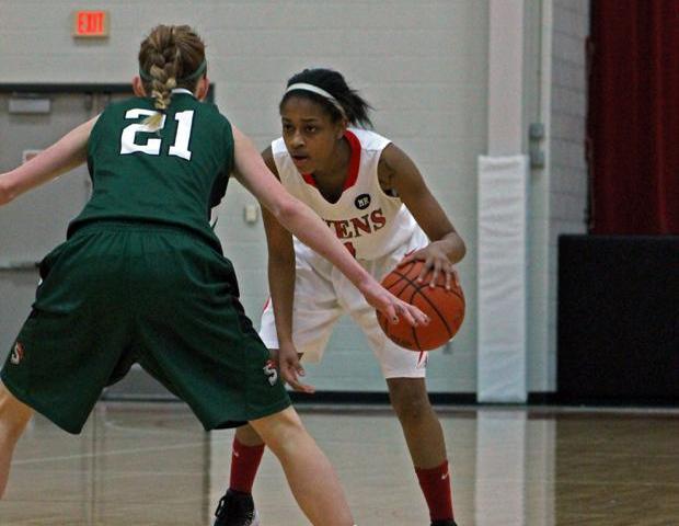 Uniqua Mitchell, pictured here against Cincinnati State's Kindsay Brandt last season, has signed with NCAA D-II Claflin University. Photo by Dave Harrand/Owens Sports Information