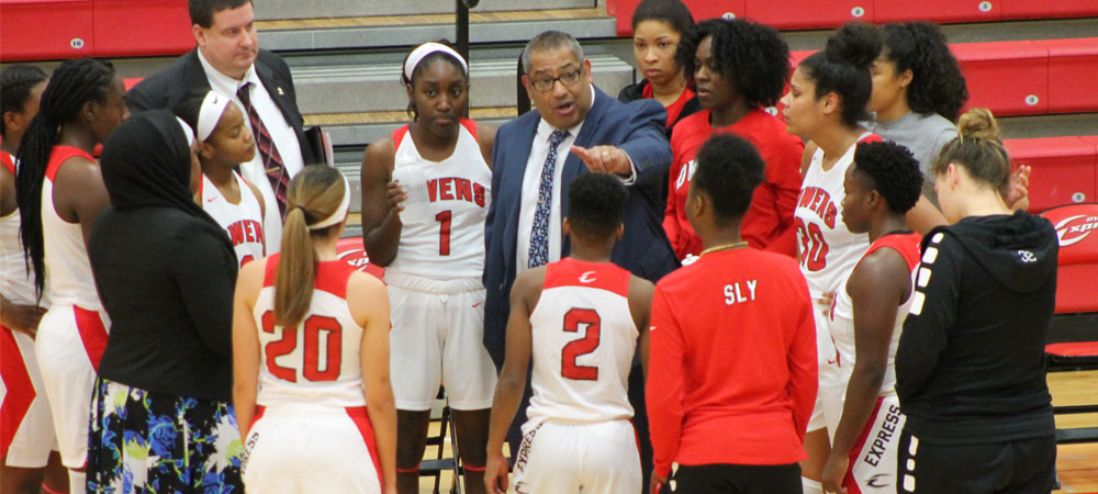 Owens head coach Mike Llanas talks to his team during a time out during a game against Monroe Community College.