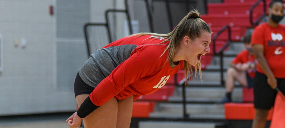 Maddie White celebrates a point in the fourth set of Saturday's four-set win over Edison State.